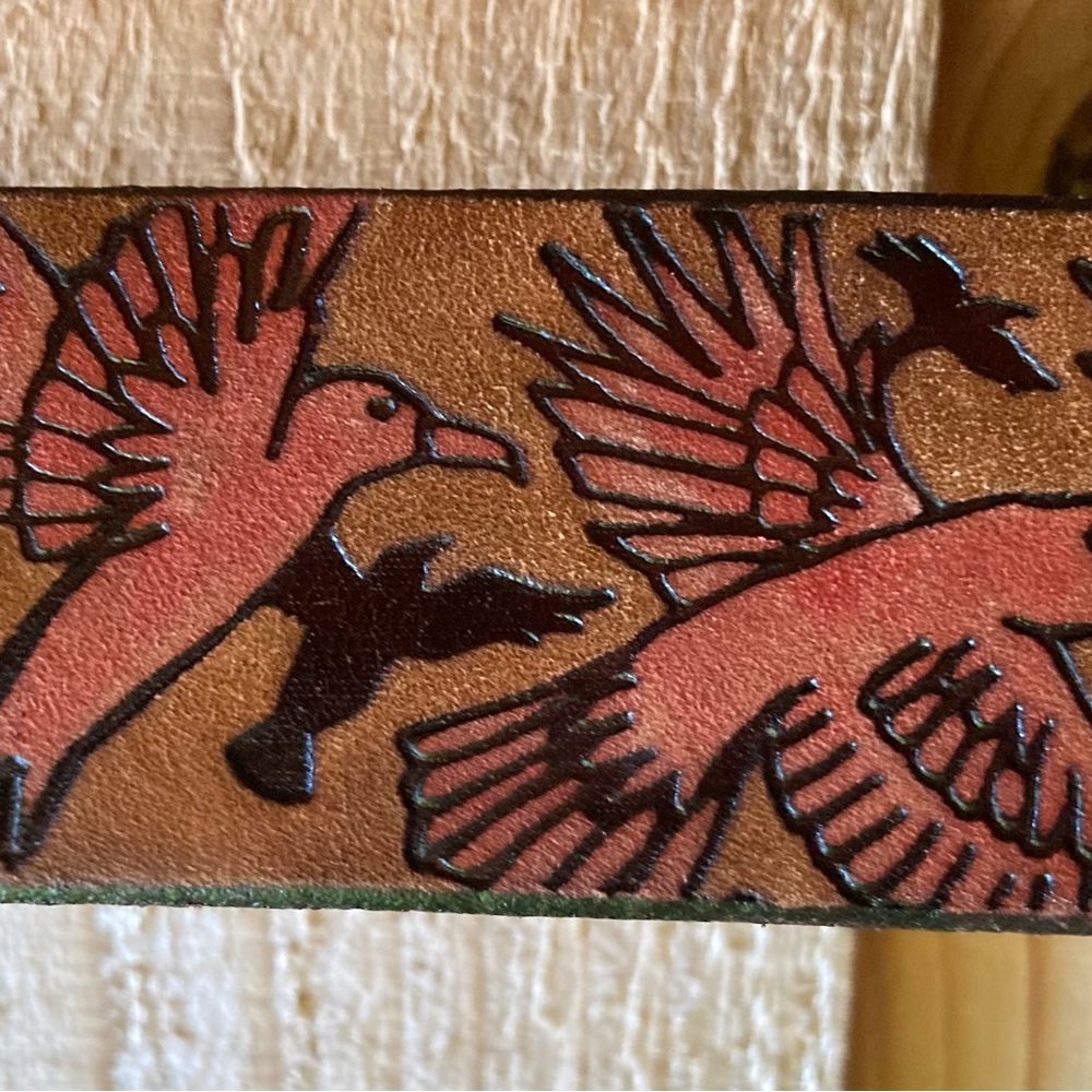 Hand tooled leather belt with pink birds